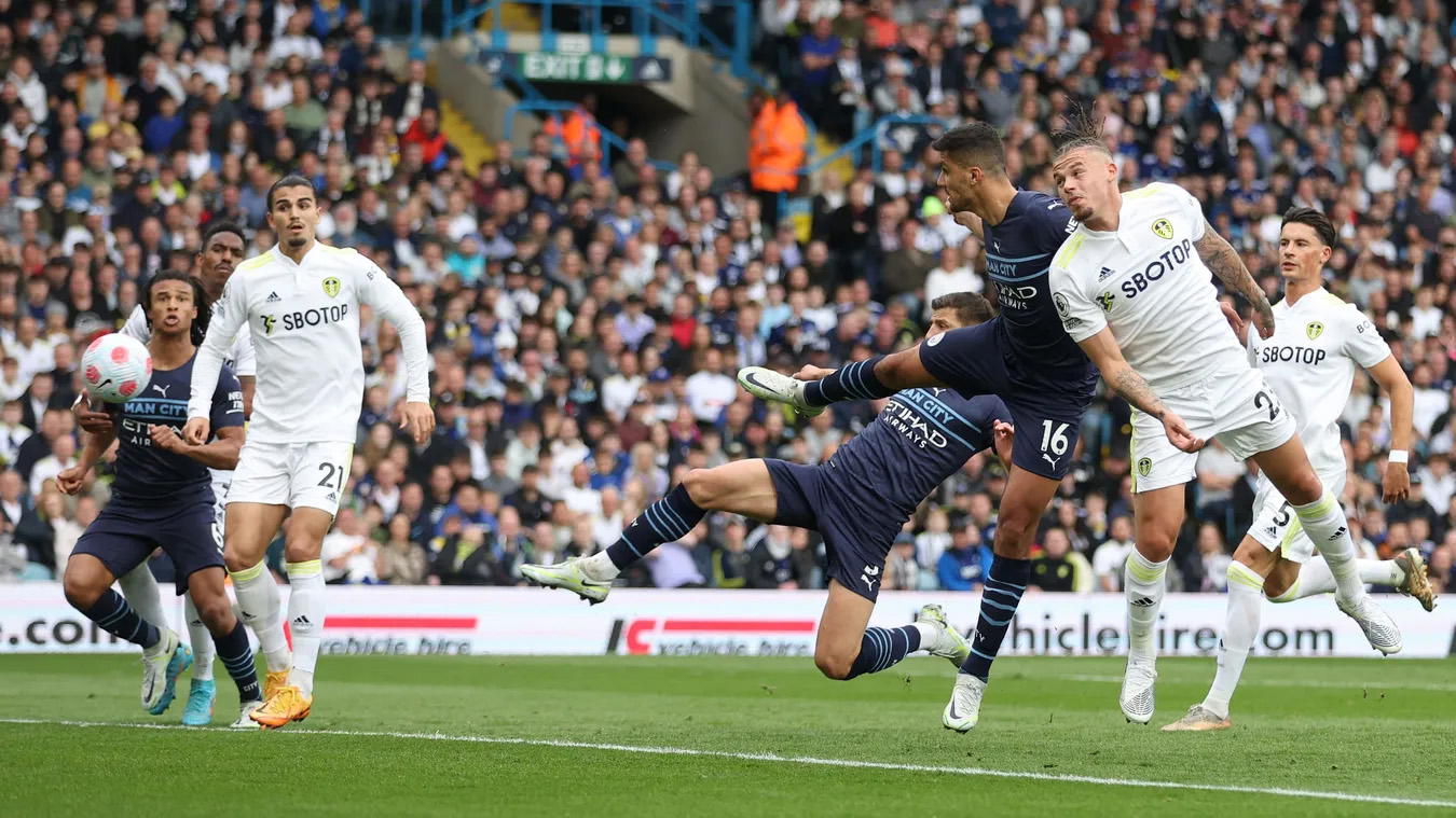 Man City ease past Leeds to reclaim top spot