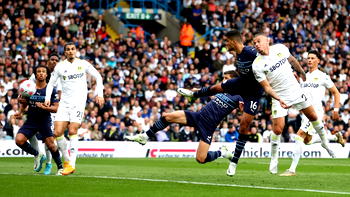 Man City ease past Leeds to reclaim top spot