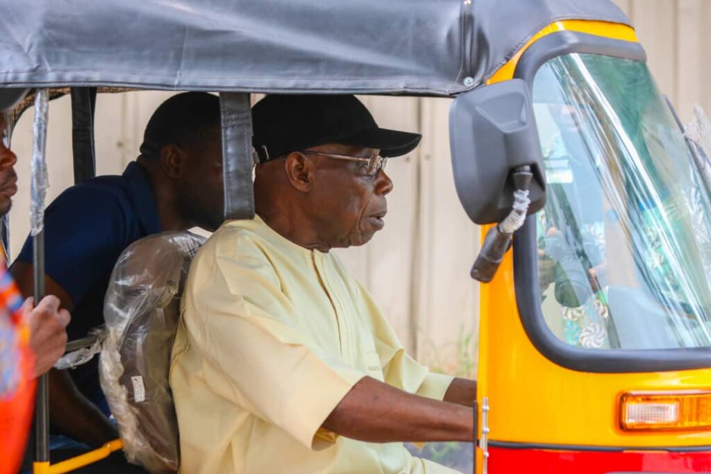Obasanjo rides tricycle, urges youths to embrace opportunities Vanguard News