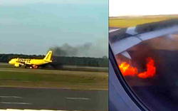 US plane catches fire on runway