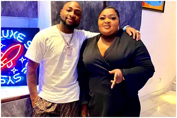 Davido blushes hard as Eniola Badmus rains cash on him [Video]