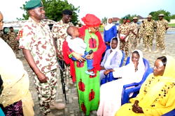 Freed Chibok school girl, three others get relief materials in Borno 