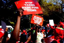Protests hit South Africa over high costs of living, inflation