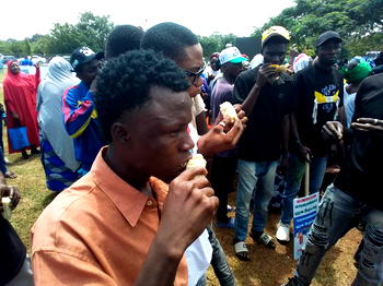 Photos: Supporters eat “Agbado” at City Boy Movement concert in Abuja
