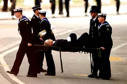 Police officer collapses, carried away on stretcher during Queen’s funeral