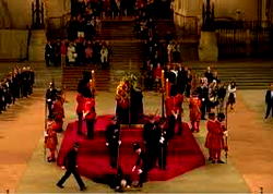 Guard watching Queen Elizabeth’s coffin faints