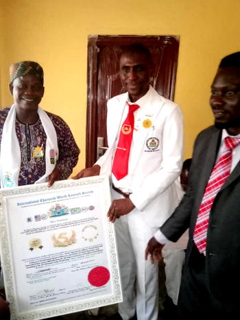 UNESCO Laureate, Aremu decorates Adebayo with five stars Global Golden Medals
