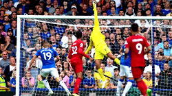 Iwobi’s Everton share points with Liverpool in eventful Merseyside derby