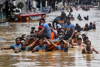 More than 60 dead as floods, landslide hit Philippines