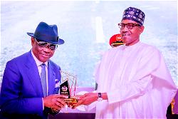Photos: Buhari honours Jonathan, Wike, others with service award