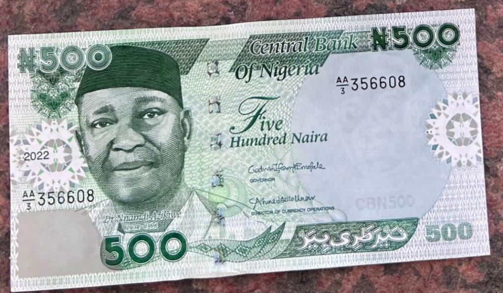  Updated Buhari Unveils New Naira Notes Vanguard News