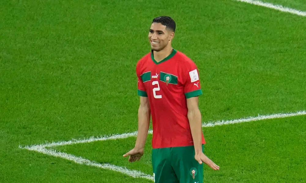 Kylian Mbappe of France with the shirt of Achraf Hakimi of Morocco at full  time during the FIFA World Cup 2022, Semi-final football match between  France and Morocco on December 14, 2022