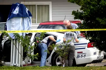 American woman kills two policemen, self
