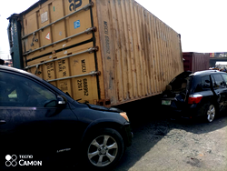 1 killed, others injured as 40-ft container falls on 3 vehicles in Lagos