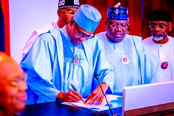 Buhari signs 2023 N21.83trn budget