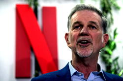 Netflix soars to 230 million subscribers, co-founder steps down