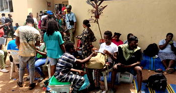 Photos: NYSC members lay siege to Abia INEC office over allowance