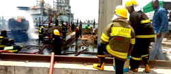 Fire guts tanker under Blue Line rail bridge