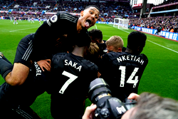 Arsenal retain top spot after two late goals against Aston Villa&nbsp;