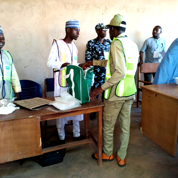Photos: INEC officials set up Sarkin Yara polling unit where Buhari will vote