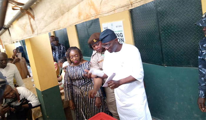 Photos: Sanwo-Olu, wife cast vote at polling units - Vanguard News