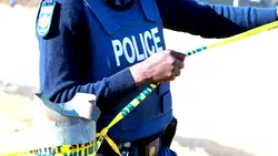 South African corruption investigator, son shot dead