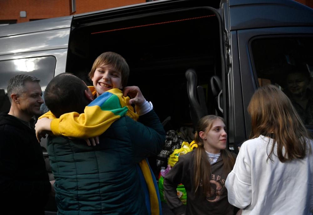 <strong>Ukraine children held by Russia reunited with parents</strong>