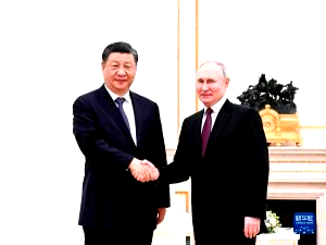 President Xi arrives in Moscow, meets President Putin