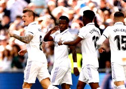 Real Madrid overcome Espanyol, close gap on Barcelona