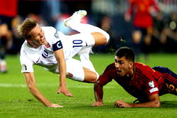 Arsenal’s Martin Odegaard reacts to heavy tackle from Man City’s Rodri