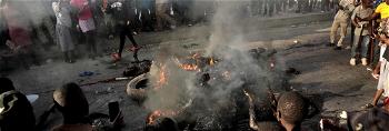 Mob sets ablaze suspected gang members in Haiti