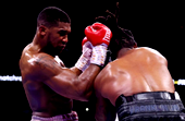 Joshua returns to winning ways by outpointing Franklin