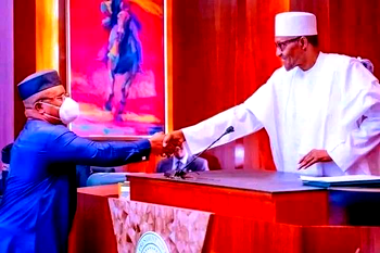 Buhari confers National Honour on Umana, Gov. Udom, Others