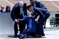 President Biden falls on Air Force stage