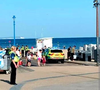 Man arrested as two children die at UK beach accident 