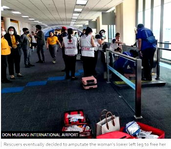 Rescuers amputate leg of woman stuck in airport travelator