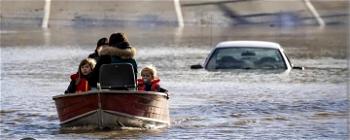 Four missing, homes plunged into darkness as floods hit Canada