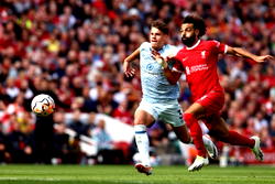 Ten-man Liverpool beat Bournemouth, Brighton go top of Premier League