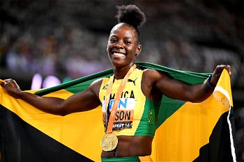 Jackson retains women’s 200m world title with stunning run