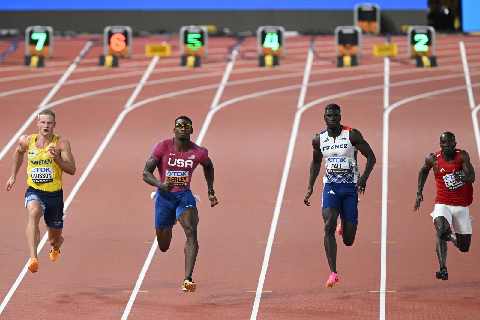 World Champs Kerley keeps his calm as Jacobs scrapes into 100m semi