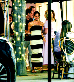 Photos: Meghan Markle adorns striped tube dress with Prince Harry on pre-birthday date