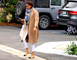 Photos: Meghan Markle steps out in camel coat in California with mysterious patch  