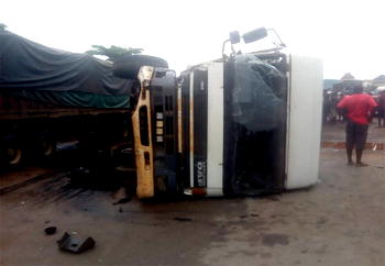 Photos: 5 women die as container crushes bus in Anambra