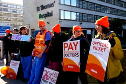 Thousands of British doctors strike again in row over pay