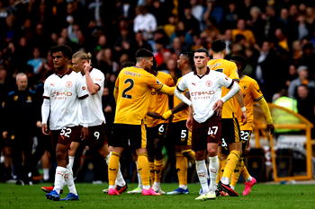 Man City shocked by Wolves, Spurs beat nine-man Liverpool