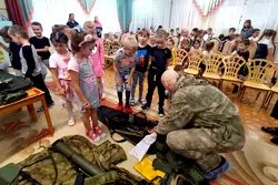 Russia turning schools to parade grounds, teaching students to assemble guns