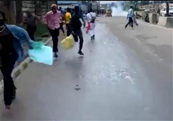 Video: Commotion as police tear gas protesting UNILAG students