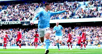 Ten-man Man City show silk and steel to extend Premier League lead