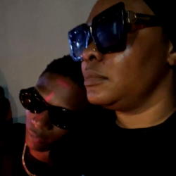 Video: Wizkid spotted looking sad at his mother’s candlelight procession