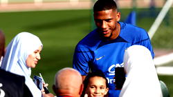 French footballer asked to explain laugh during minute’s silence